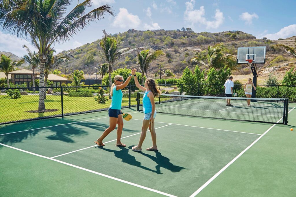InPickleball | You can play pickleball—well, maybe not in flip-flops! | WIMCO Villas